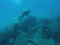   Jumbled Wreck. Exploring concrete pipes laid aside Sea Emperor when she rolled while sinking. Deerfield Beach Florida. Olympus SP350 Ikelite housing DS51 strobe Inon WAL. Wreck". Wreck" sinking Florida DS-51 DS 51 WAL  